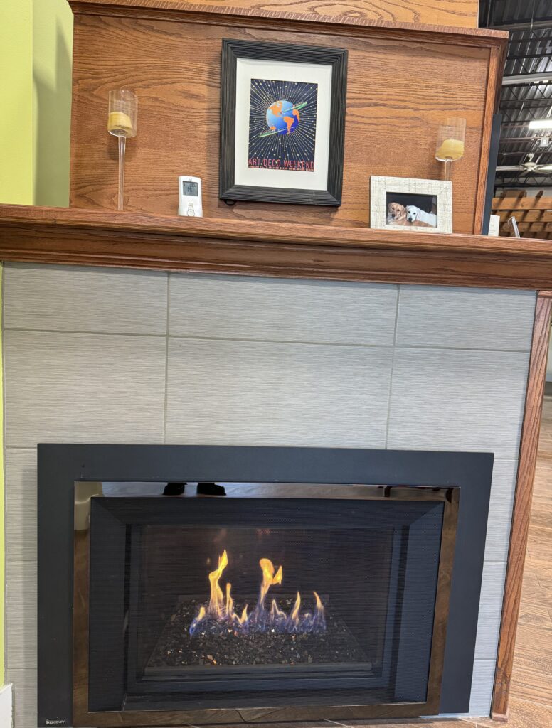 Regency HRi6E Large Contemporary Direct Vent Gas Insert shown with black enamel inner panels which reflects the flames and creates a beautiful flame presentation